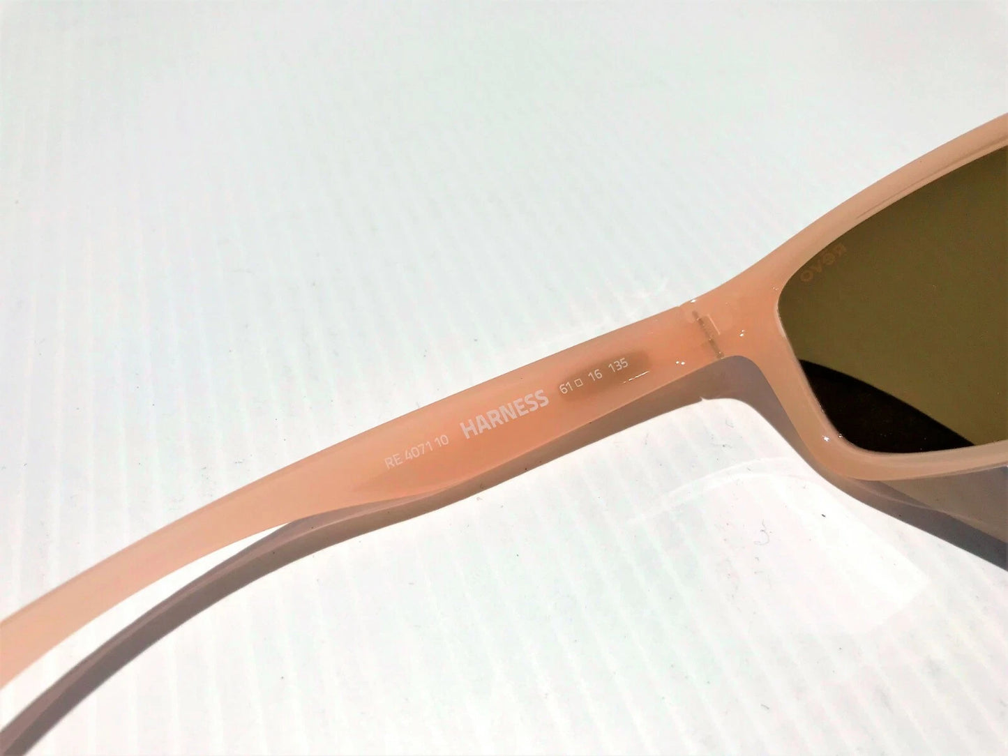 REVO HARNESS Blush Frame POLARIZED Champagne Glass Lens Sunglass RE 4071 10 CH
