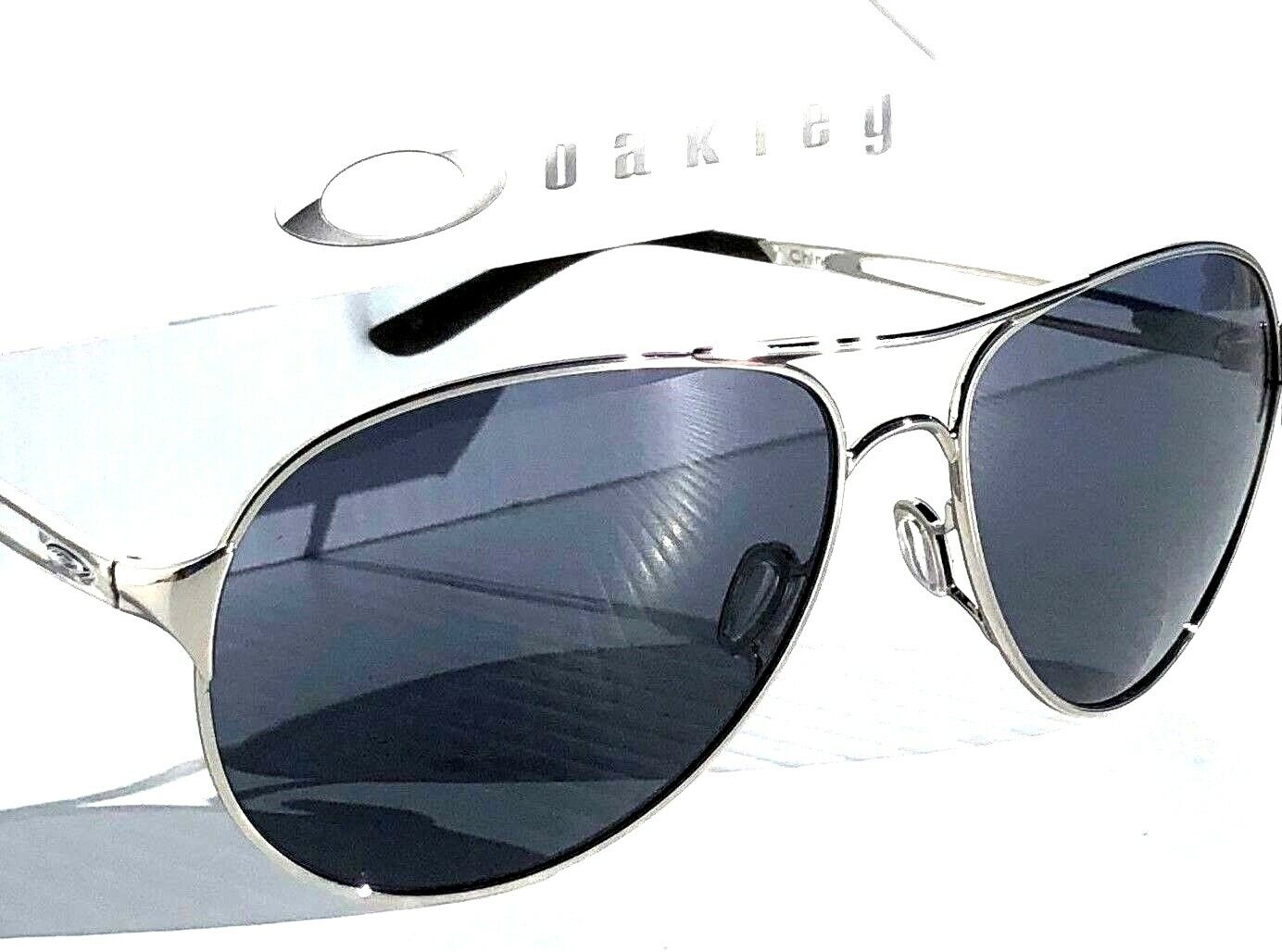 Oakley CAVEAT in Silver Frame with POLARIZED Galaxy Black Lens Sunglasses oo4054 - Two-Lens Bundle!