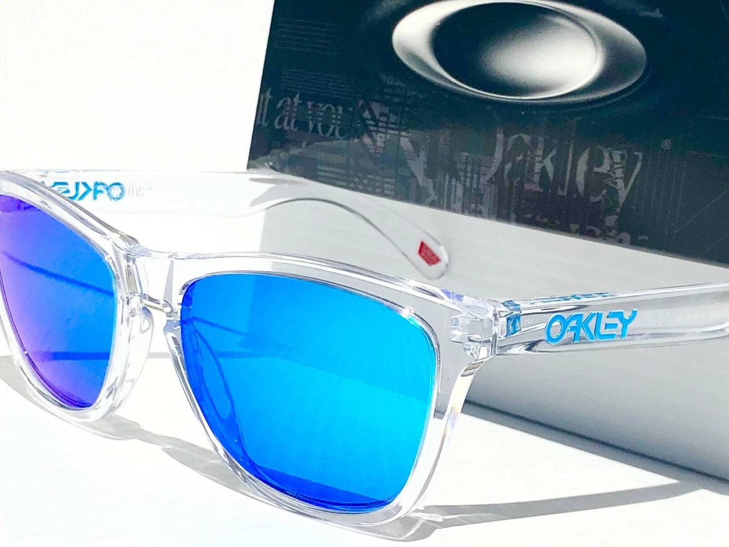 Oakley Frogskins Clear Polished Crystal Frame PRIZM Sapphire Blue Lens Sunglass 9013-D0