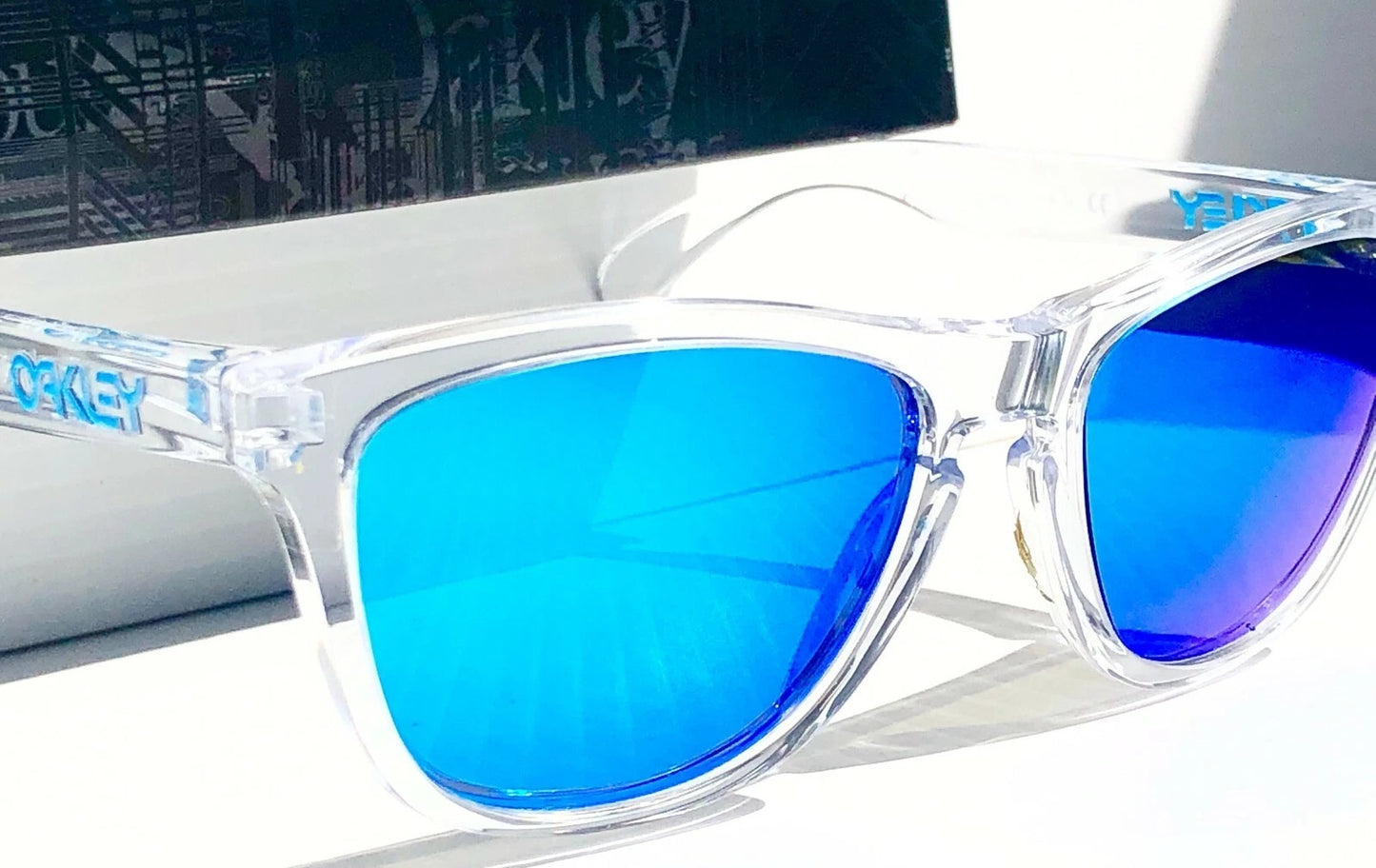 Oakley Frogskins Clear Polished Crystal Frame PRIZM Sapphire Blue Lens Sunglass 9013-D0