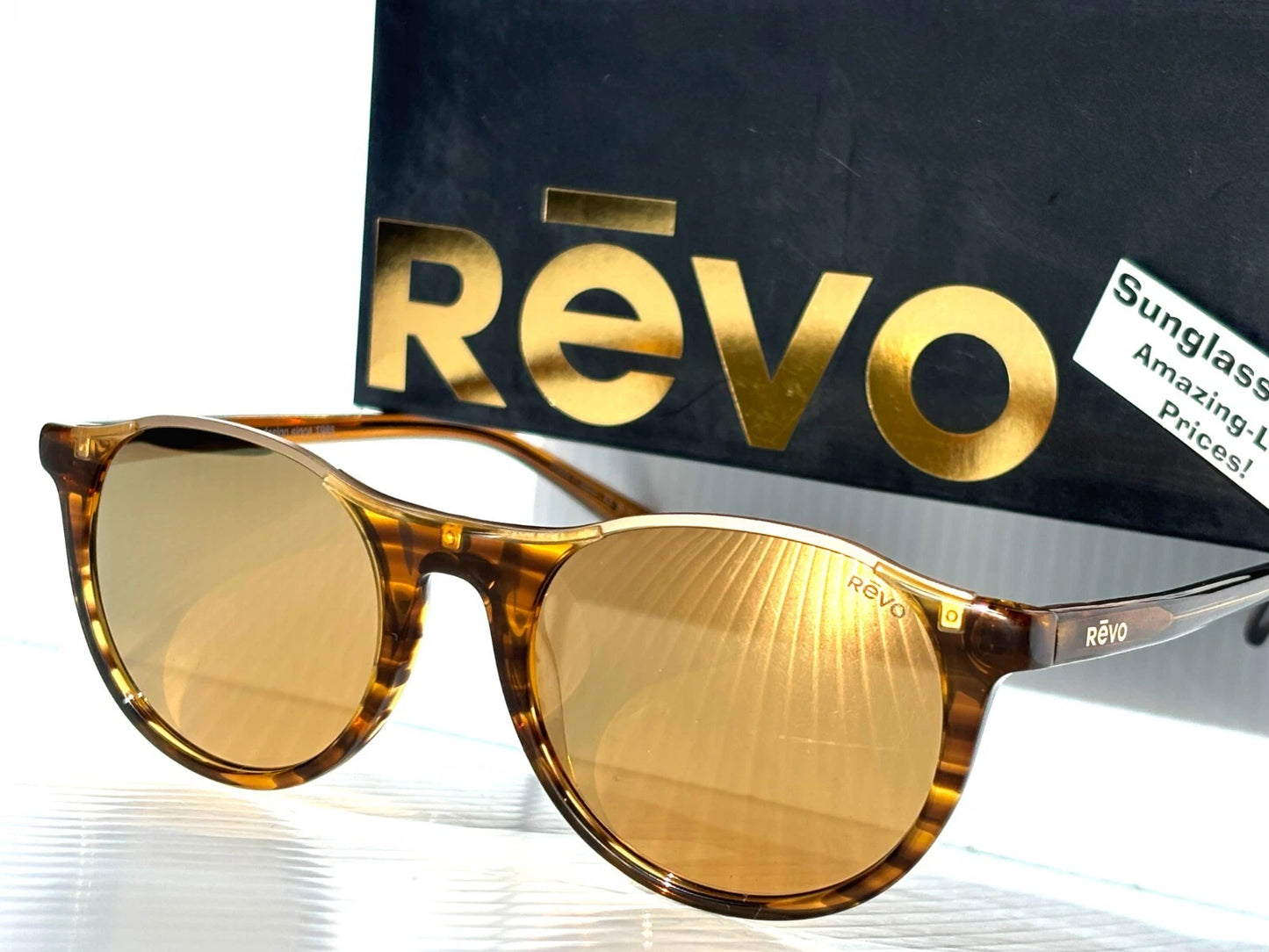 REVO NOLITA Amber Horn POLARIZED Champagne Gold Lens Sunglass RE 2200 11 CH