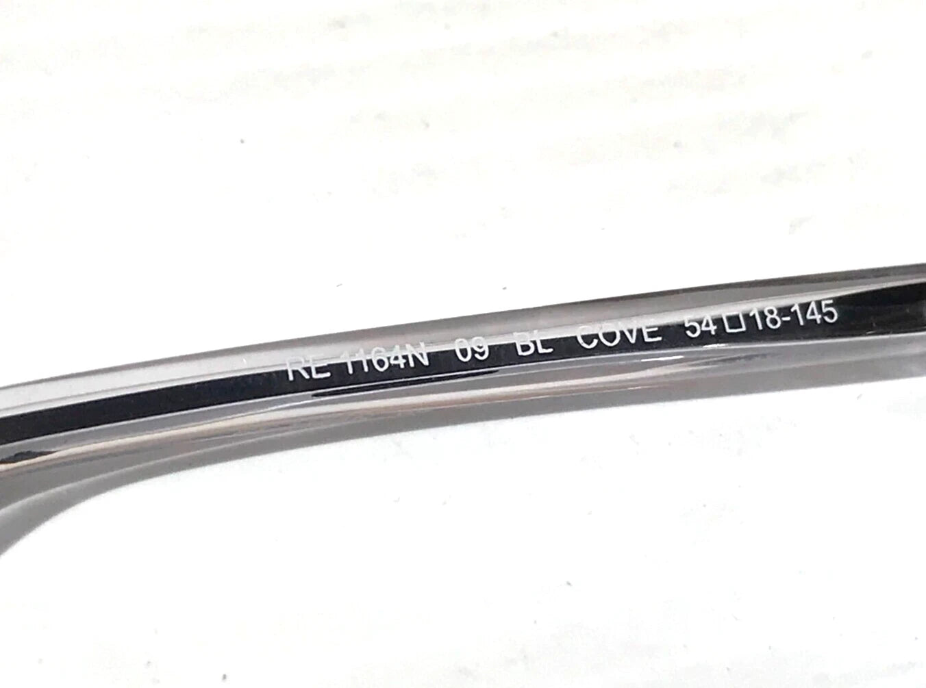 REVO COVE Shiny Crystal Clear POLARIZED Blue Lens Sunglass RE 1164N 09 BL