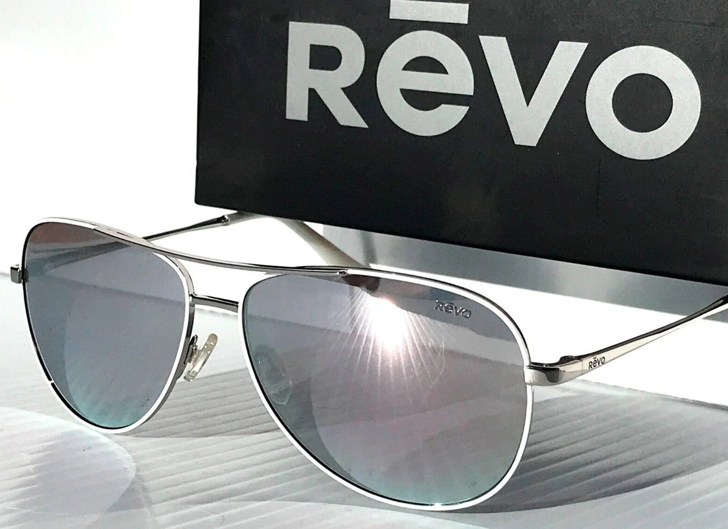 REVO RELAY Shiny Chrome Aviator POLARIZED Chrome Lens Sunglass RE 1014 03 ST