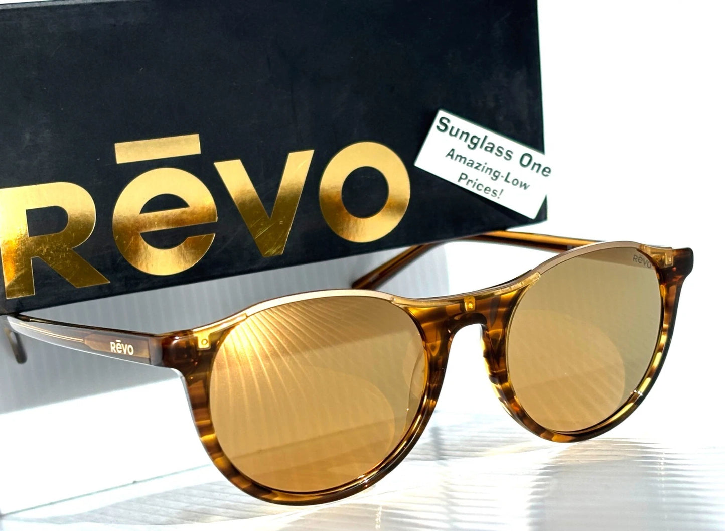 REVO NOLITA Amber Horn POLARIZED Champagne Gold Lens Sunglass RE 2200 11 CH