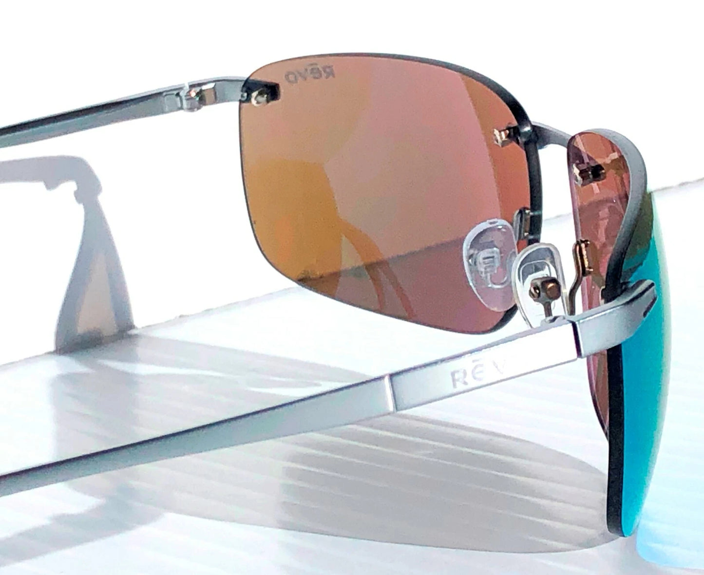 REVO DESCEND Z Metal Satin Chrome POLARIZED Blue Water Lens Sunglass RE 1170 03 BL