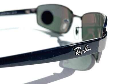 Ray Ban Gunmetal Frame with POLARIZED Dark Green Lens Sunglass RB 3364 004/58