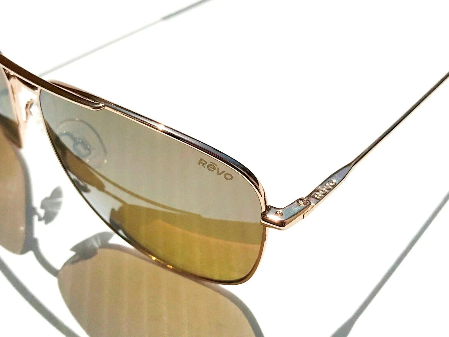 REVO HARBOR Shiny Gold Aviator POLARIZED Bronze Lens Sunglass RE 1082 04 BR