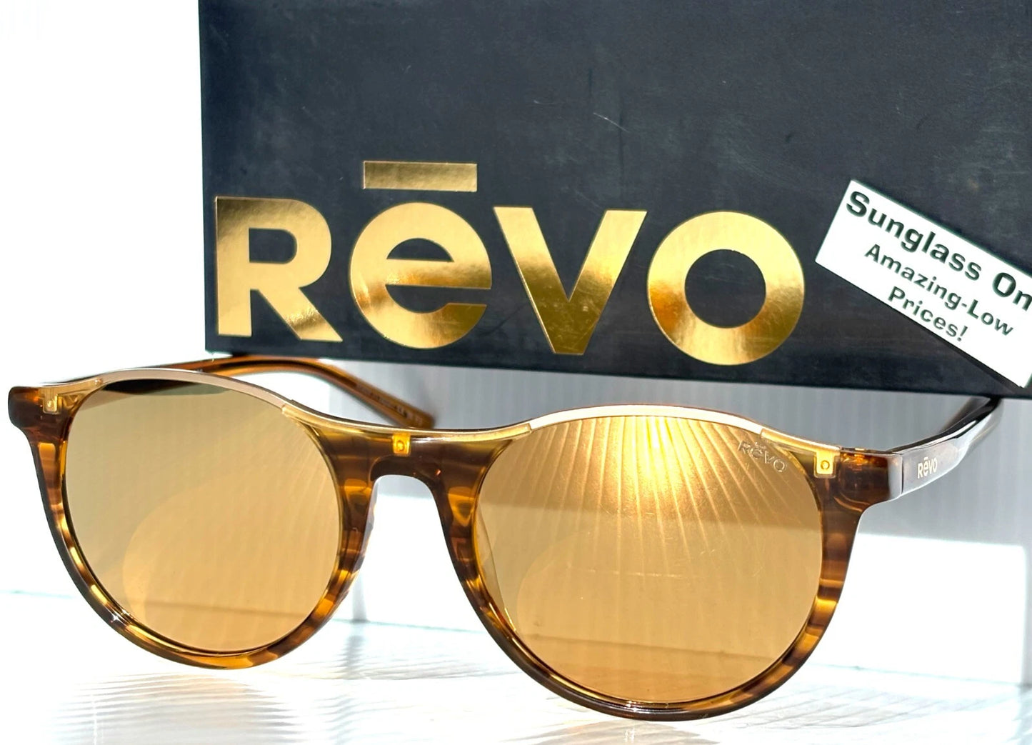 REVO NOLITA Amber Horn POLARIZED Champagne Gold Lens Sunglass RE 2200 11 CH