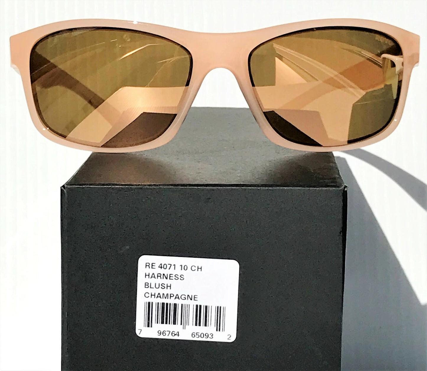 REVO HARNESS Blush Frame POLARIZED Champagne Glass Lens Sunglass RE 4071 10 CH
