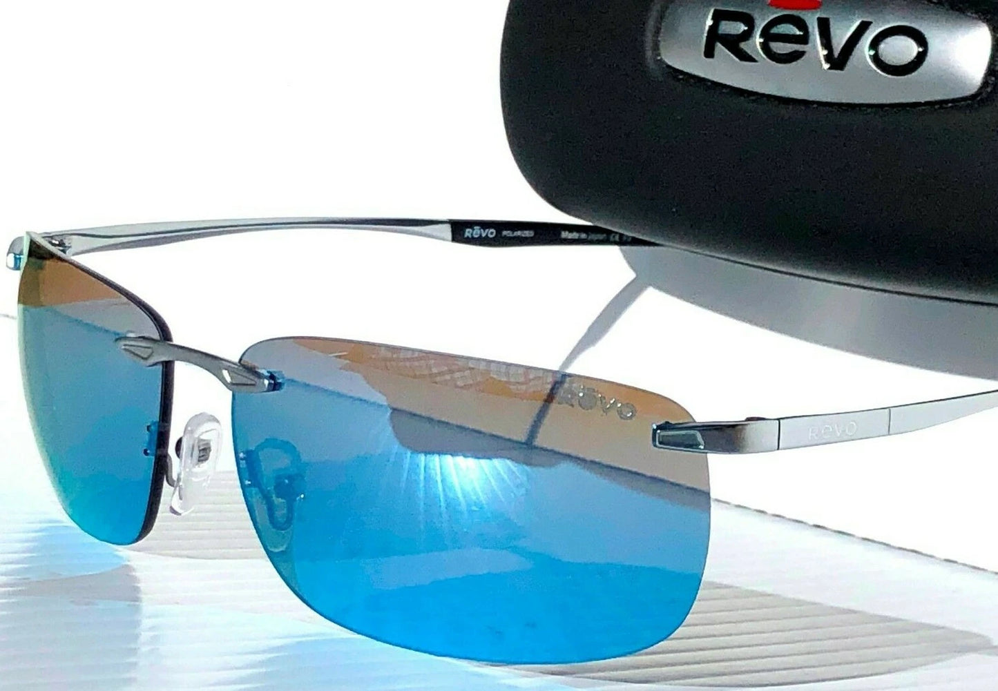 REVO DESCEND Z Metal Satin Chrome POLARIZED Blue Water Lens Sunglass RE 1170 03 BL