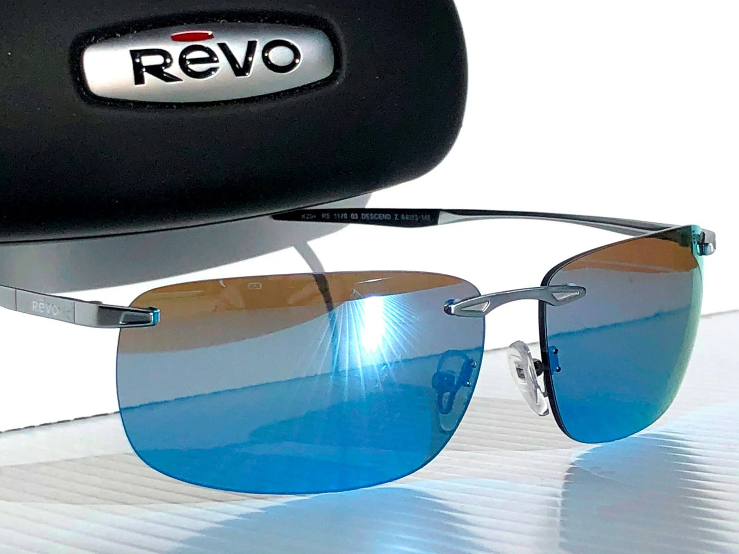 REVO DESCEND Z Metal Satin Chrome POLARIZED Blue Water Lens Sunglass RE 1170 03 BL
