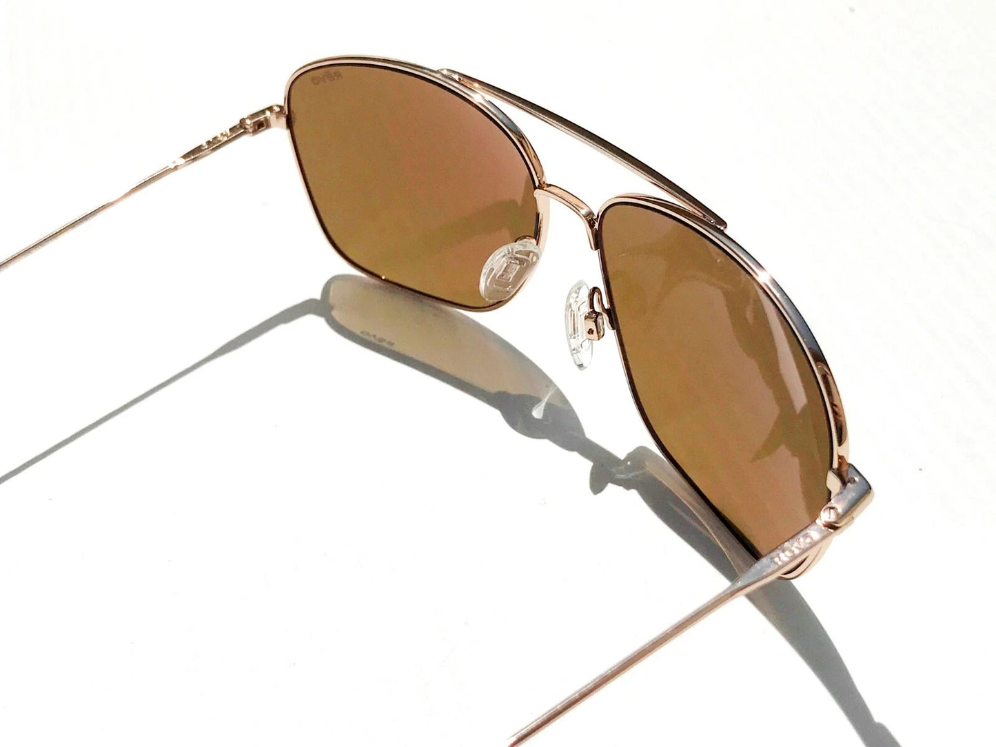 REVO HARBOR Shiny Gold Aviator POLARIZED Bronze Lens Sunglass RE 1082 04 BR
