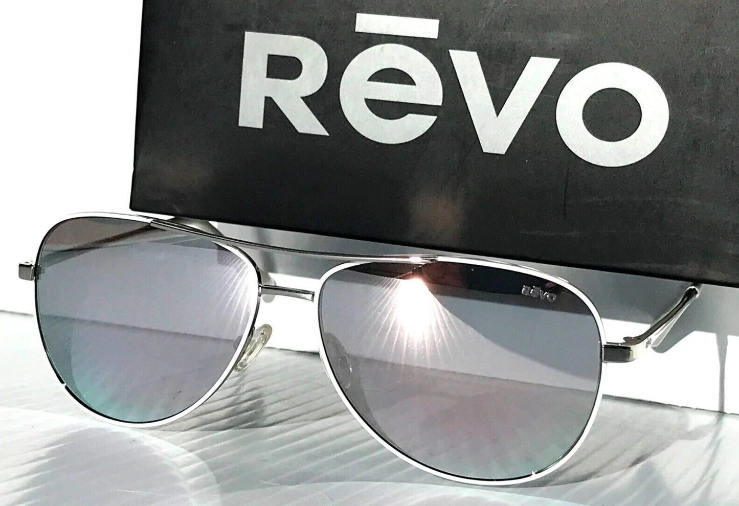 REVO RELAY Shiny Chrome Aviator POLARIZED Chrome Lens Sunglass RE 1014 03 ST
