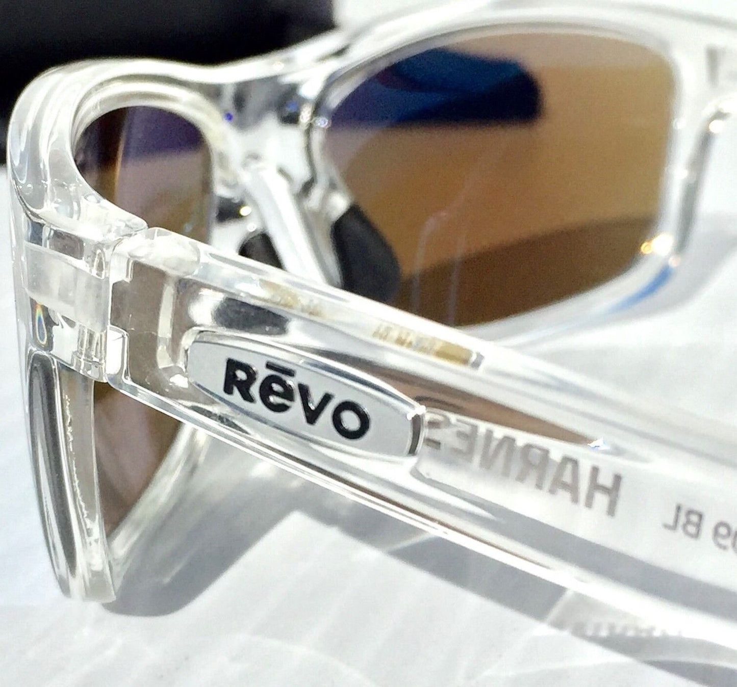 REVO HARNESS in Clear Frame POLARIZED Blue Lens Sunglass RE 4071 09 BL